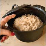 Dough resting in a cast-iron pan.