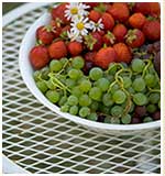 bowl of strawberries and grapes