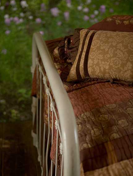 Bed with a view, all comfily decked out in our own comforters and pillows.